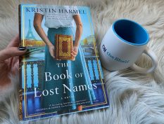 Book of Lost Names with mug
