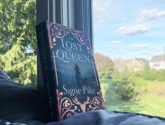 The Lost Queen book by window
