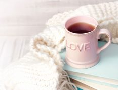 Love mug on top of books
