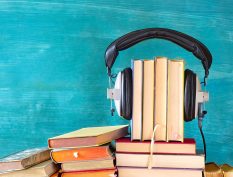 Books wearing headphones