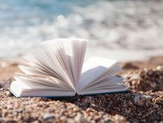 Open book by the ocean
